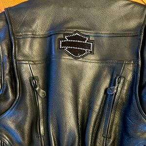 Leather jacket with Harley Davidson logo on back